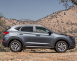 Фото вида сбоку Hyundai Tucson обновленного в 2016